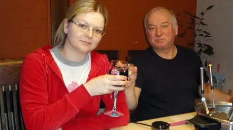 Sergei Skripal with his daughter, Yulia, having a drink together