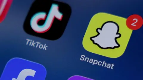 Reuters Mobile phone showing Snapchat