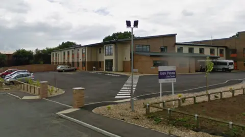 Google A street-view screenshot showing Iceni House, a two-storey building with a car park outside.