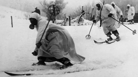Getty Images Finnish ski troops wearing gas masks in 1940 as they go into battle against the Soviet Union
