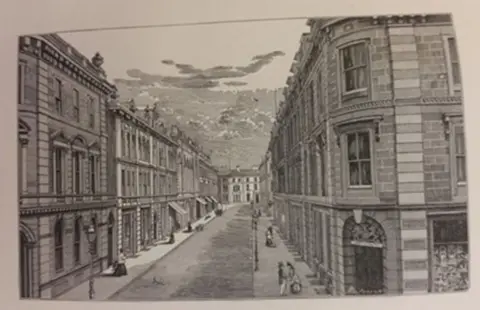 Mel M-McKay/HLH Fraser-Mackintosh collection This black and white print shows Inverness's Union Street in its early days. People in Victorian dress can be seen on the pavements and the buildings look grand with large elegant windows and doorways. 