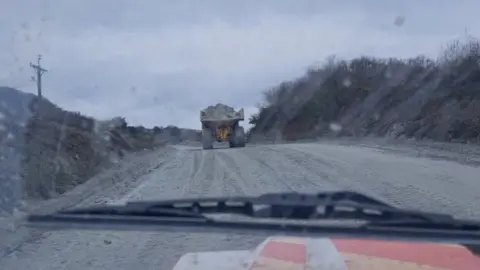 Imerys in Cornwall A large truck driving through a clay pit carrying heavy material