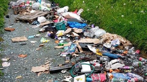 A close-up photo of the fly-tipped waste in the lane in Trefonen, Shropshire