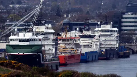 Getty Images Ships involved in oil and gas supply chain line docks