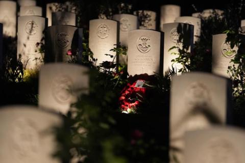 Some of the 4,600 headstones lit up during the Commonwealth War Graves Commission's Great Vigil to mark the 80th anniversary of D-Day, at the Bayeux War Cemetery in Normandy, France