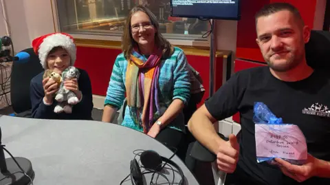 Hew, his mother and Luke Waclawek in the BBC Oxford studio