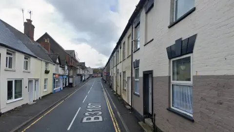 A view of North Street in Wellington. It's a narrow road with residential houses on either side.