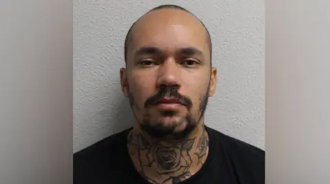 Met Police Leigh Holder custody image