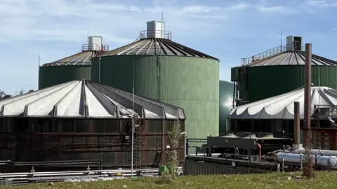 Three large digesters and other silos which make up part of the digester site in Holsworthy