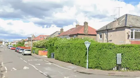 A general view of Sighthill View and Sighthill Crescent. The street is made up of four-plex type properties. It is a sunny day.