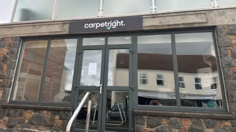 BBC The front of Carpetright's shop in St Peter Port, Guernsey