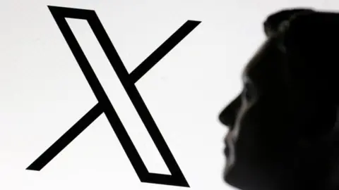 A 3D-printed miniature model of Elon Musk and the X logo are seen in this illustrative photo.