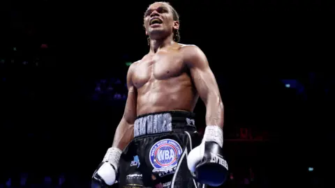 Gerome Warburton celebrates his win