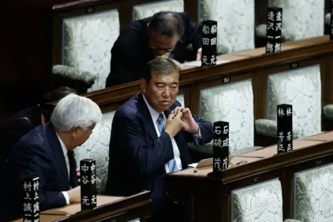 Japan: Shigeru Ishiba Secures New Term As PM, But Challenges Loom