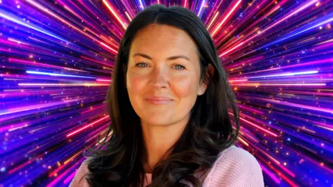 Lacey Turner pictured in front of the glittery Strictly Come Dancing background