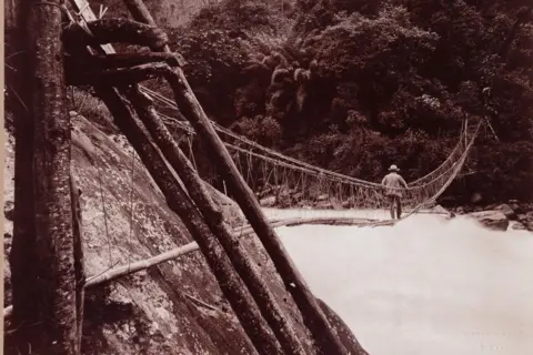 Dag Qasb Bridge on its way from Tumlong to Chonontang[Chungthang, North Sikkim]Collection print installed on the card, 1899