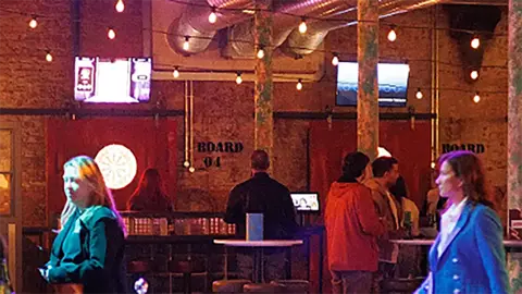 Factory Floor Guests inside the restored cotton mill which is opening as an entertainment venue.