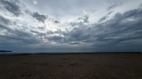 A view of a cloudy sky over Ayr Beach