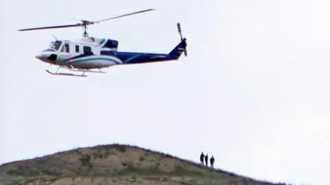 Reuters A Iranian government Bell 212 carrying President Ebrahim Raisi takes off from the Qiz-Qalasi Dam (19 May 2024)