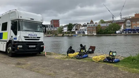 Luxmy Gopal/BBC Divers by the river