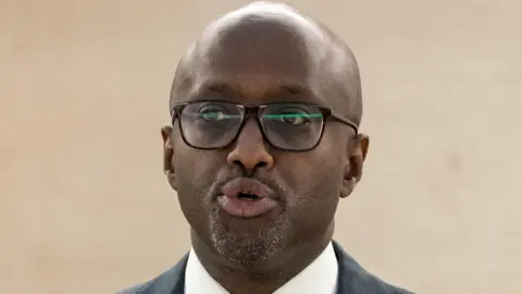 Minister Olivier Nduhungireh talking.