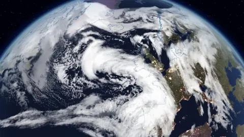 Image shows the area of cloud that will bring strong winds and heavy rain to parts of the UK through Sunday and Monday