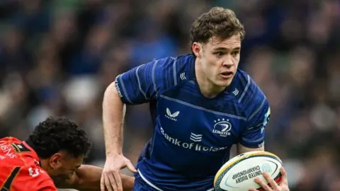 Rob Russell with the ball under a tackle during a match for Leinster this season