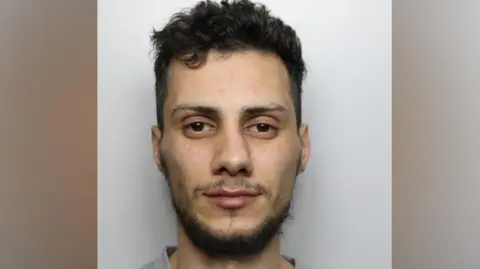 mugshot of Hakam Ghaith