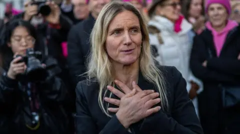 Getty Images Kim Leadbeater stands with her hands across her chest as she reacts to meeting supporters of her assisted dying bill