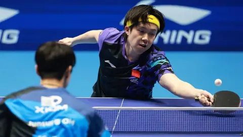 Wang Chuqin playing for China