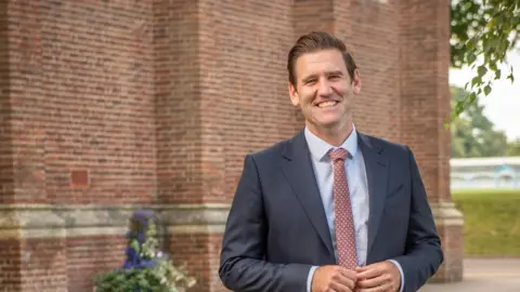 Wellington School A man in a suit