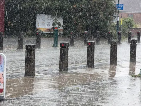 BBC Weather Watchers/Tea for Tracy Flooded streets with bollards