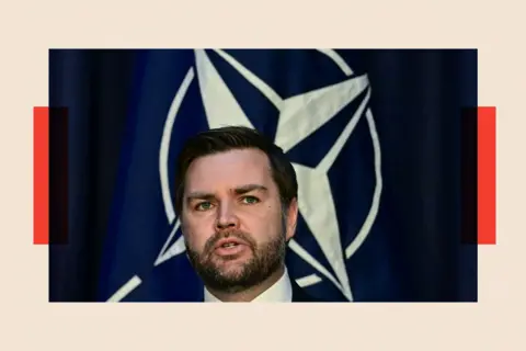 AFP via Getty Images US Vice President JD Vance talks in front of the Nato logo 

