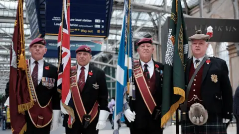 Veterans gathered at Glasgow Central station for the silence
