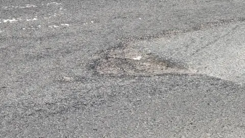 A pothole.