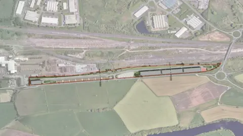 Cumberland Council A blueprint shows the plans for the new railhead in Cargo. It is a long rectangular shape which runs beside rail tracks and a main road.