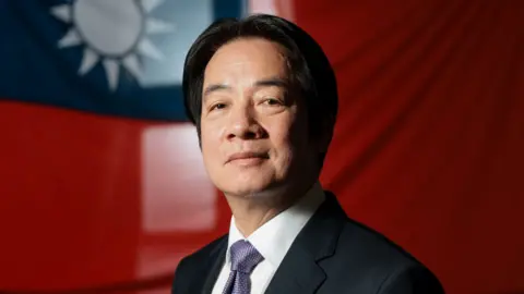 Taiwan's President Lai Ching-te poses during an exclusive interview with AFP at the Presidential Office Building in Taipei on February 10, 2026.