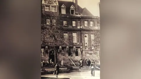 Leicester City Council: Story of Leicester An image showing damage to the Town Hall in Leicester after a bomb smashed through the roof and several floors