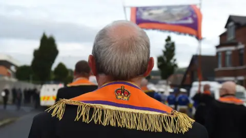 Getty Images Back of head of an orange man in Ardoyne