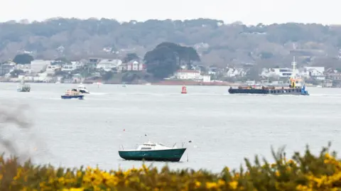 Reuters/ Peter Cziborra A view across Poole harbour in Dorset, with boats in the background.