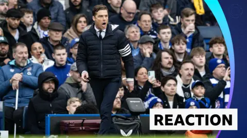 Burnley manager Scott Parker mid-match against Chelsea