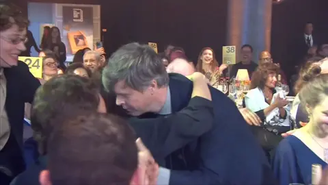 David Szalay celebrates after winning Booker Prize 2025