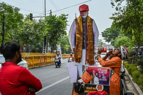 Getty Images A cardboard cut-out of India's Prime Minister Narendra Modi during vote counting for the national elections in New Delhi, India, on Tuesday, June 4, 2024.