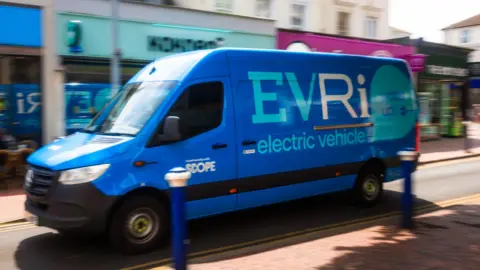 Getty Images A blue Evri van with the company written on the back and side. It also says 'electric vehicle' 