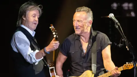 Getty Images Paul McCartney and Bruce Springsteen at Glastonbury, 2022