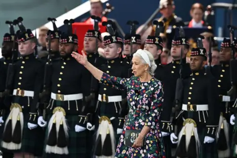 Dylan Martinez/PA Media Dame Helen Mirren on stage 