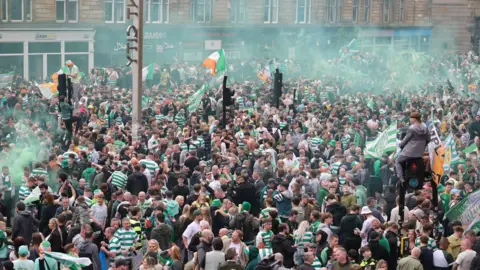 PA Media Celtic fans took over the Trongate area of Glasgow after winning the league title