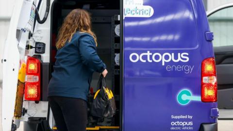 An employee loads tools in to a van at the Octopus Energy training centre in Slough