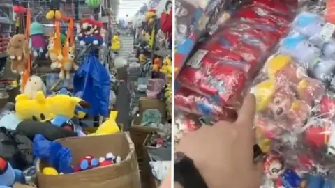 Screengrab from video of a lot of toys in a warehouse - including Pokemon, Mario, Bingo from Bluey, Spiderman and Paw Patrol cuddly toys.
