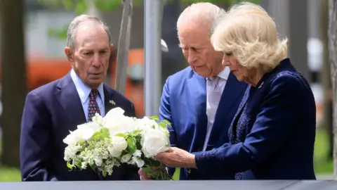 Former New York Mayor Michael Bloomberg, chairman of the National September 11 Memorial, King Charles III and Queen Camilla attend a ceremony at the National September 11 Memorial during a state visit on April 29, 2026 in New York City. 